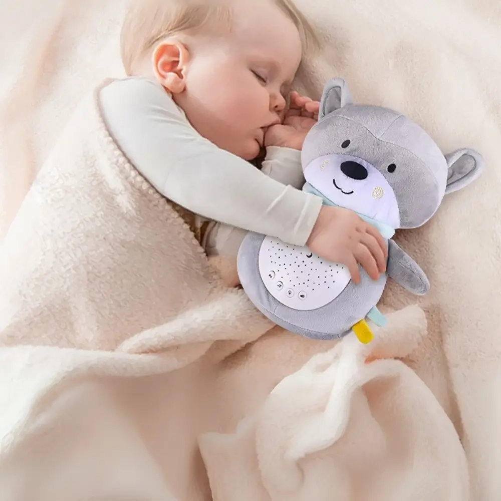 Moni-Toys-Nocna-lampa-sa-projektorom-i-belom-bukom-Snuggly-Raccoon-slika-projektora-1